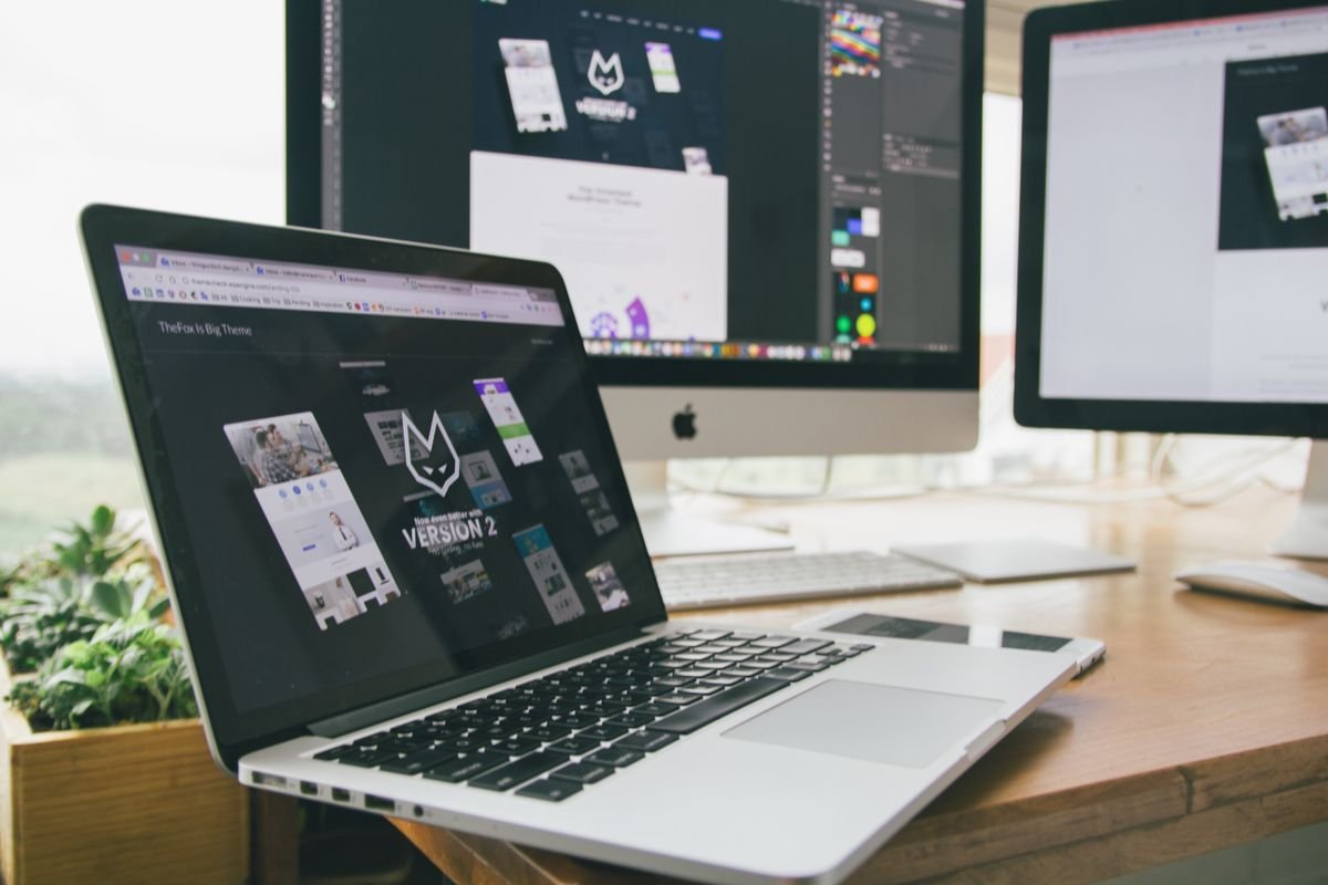 Ecommerce UX Audit 3 Laptop and monitors in a web design workspace