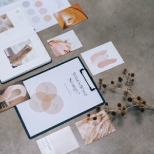 Branding documents and design materials on a desk
