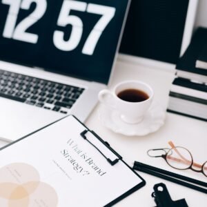 Brand strategy clipboard in a creative workspace