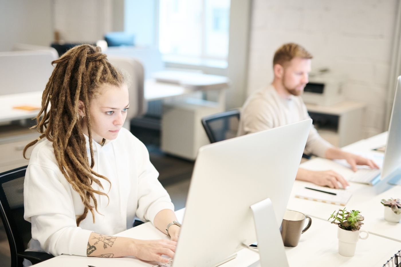 Paid Social Campaign Management 1 Team reviewing digital campaign metrics