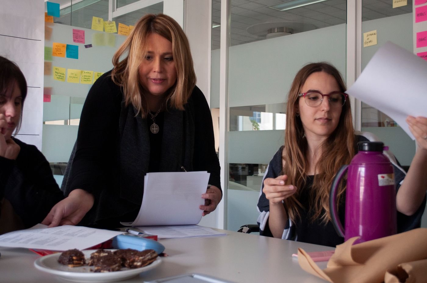 Product Page Optimization 3 Team reviewing product availability and operations